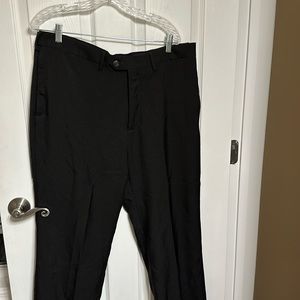 Black Haggar dress pants. 38x30 with expanding waistband.